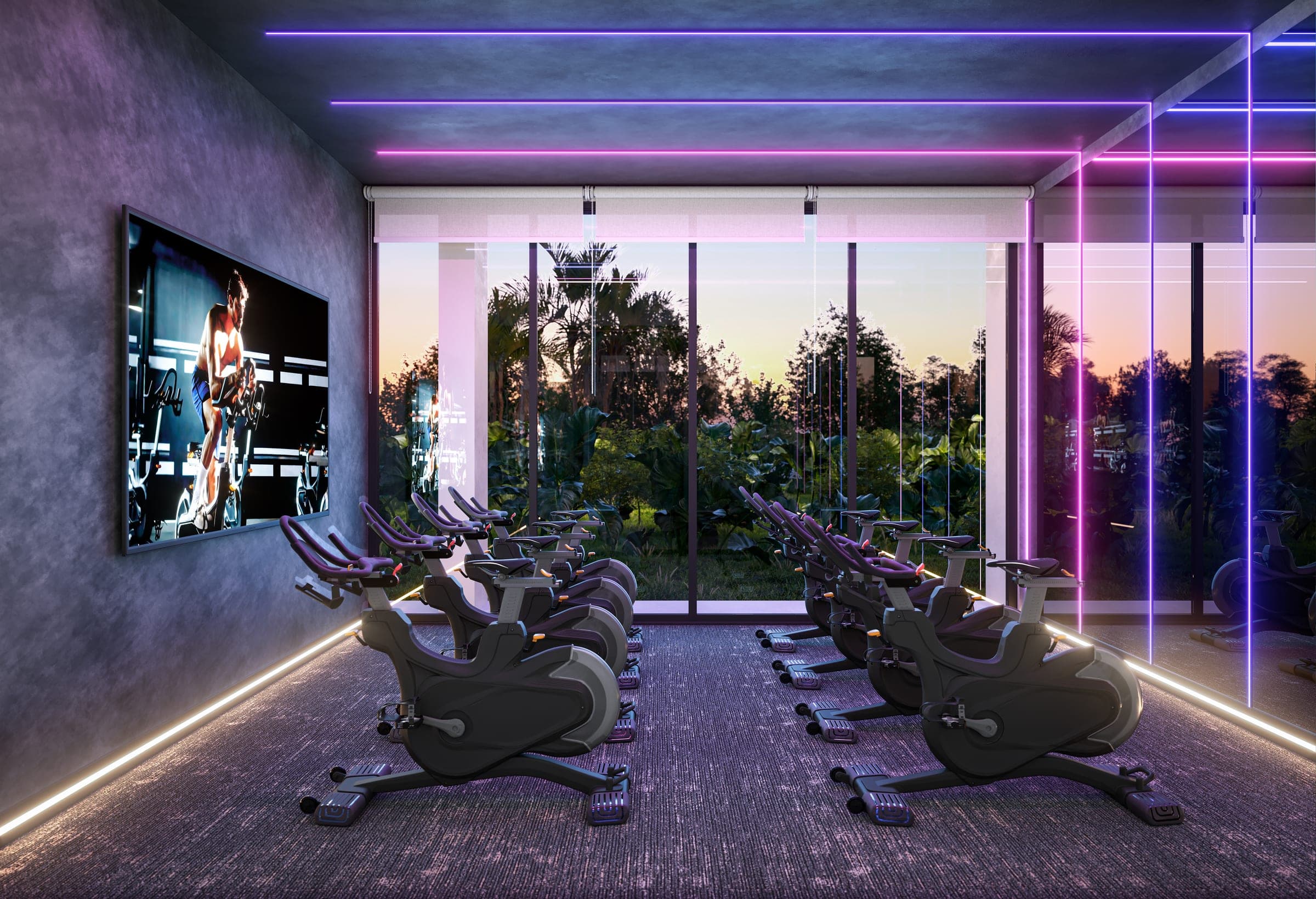 Espaço fitness com bike indoor no térreo
